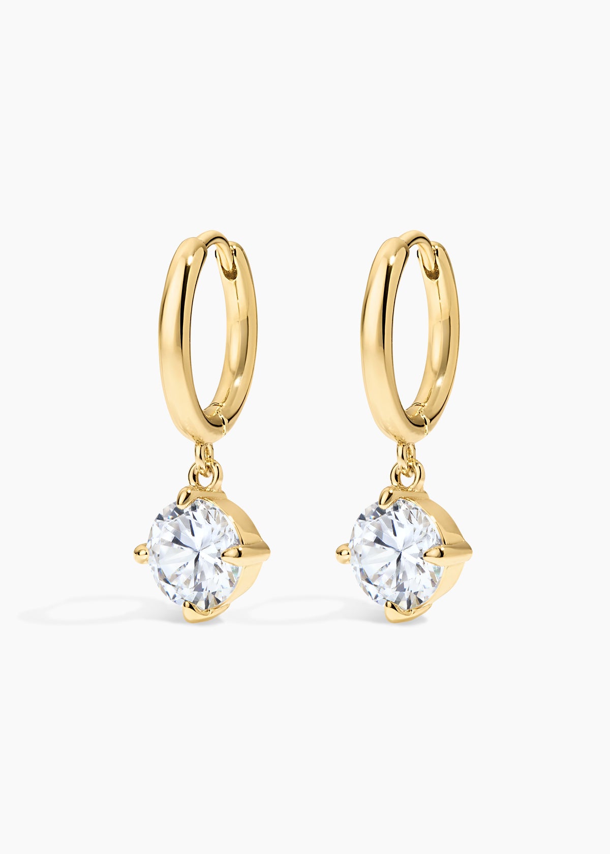 Monroe Hoops, gold huggie hoops with a prong-set round crystal drop