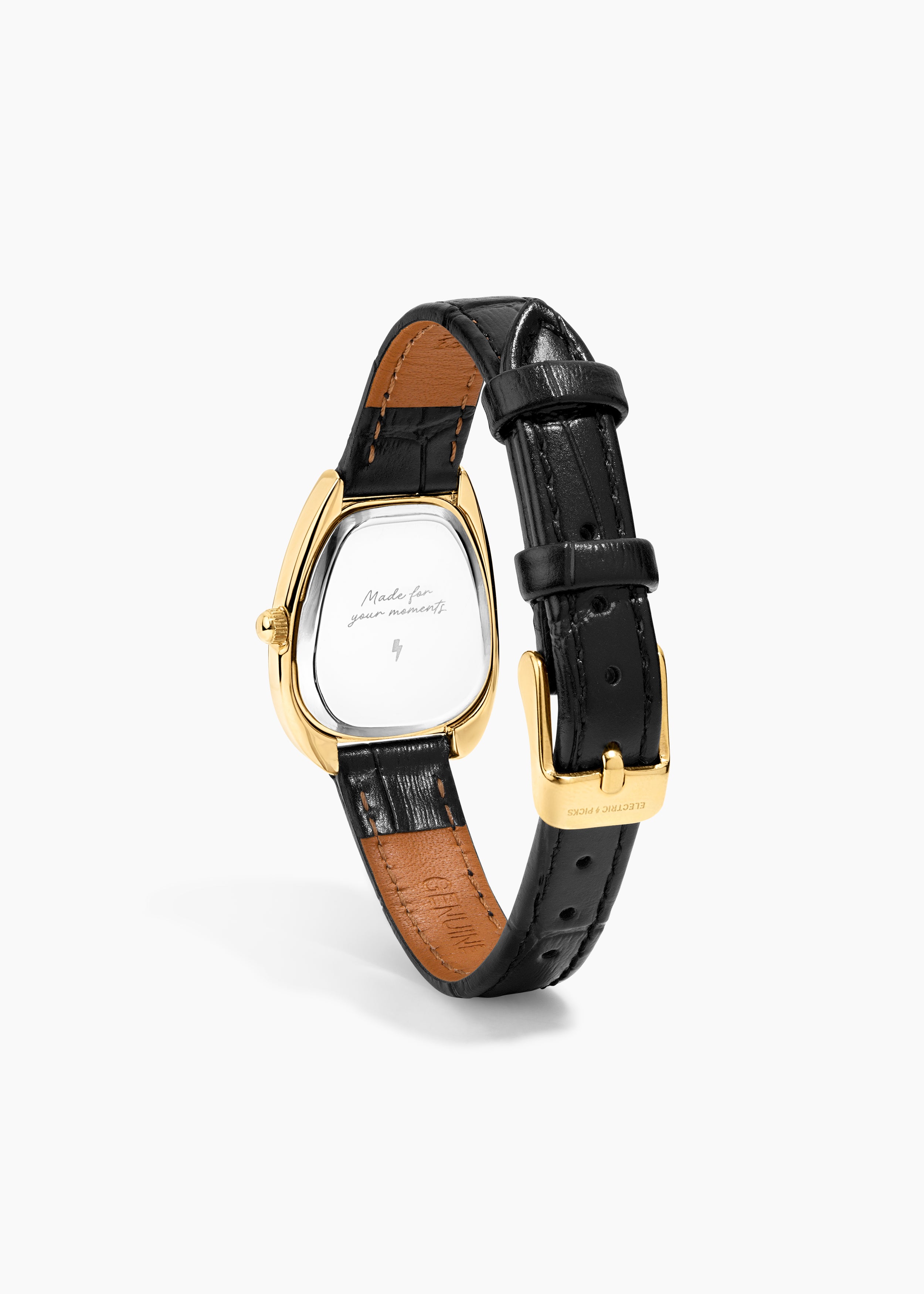 Everyday Watch, gold watch with a black leather band, back view showing the engraved caseback