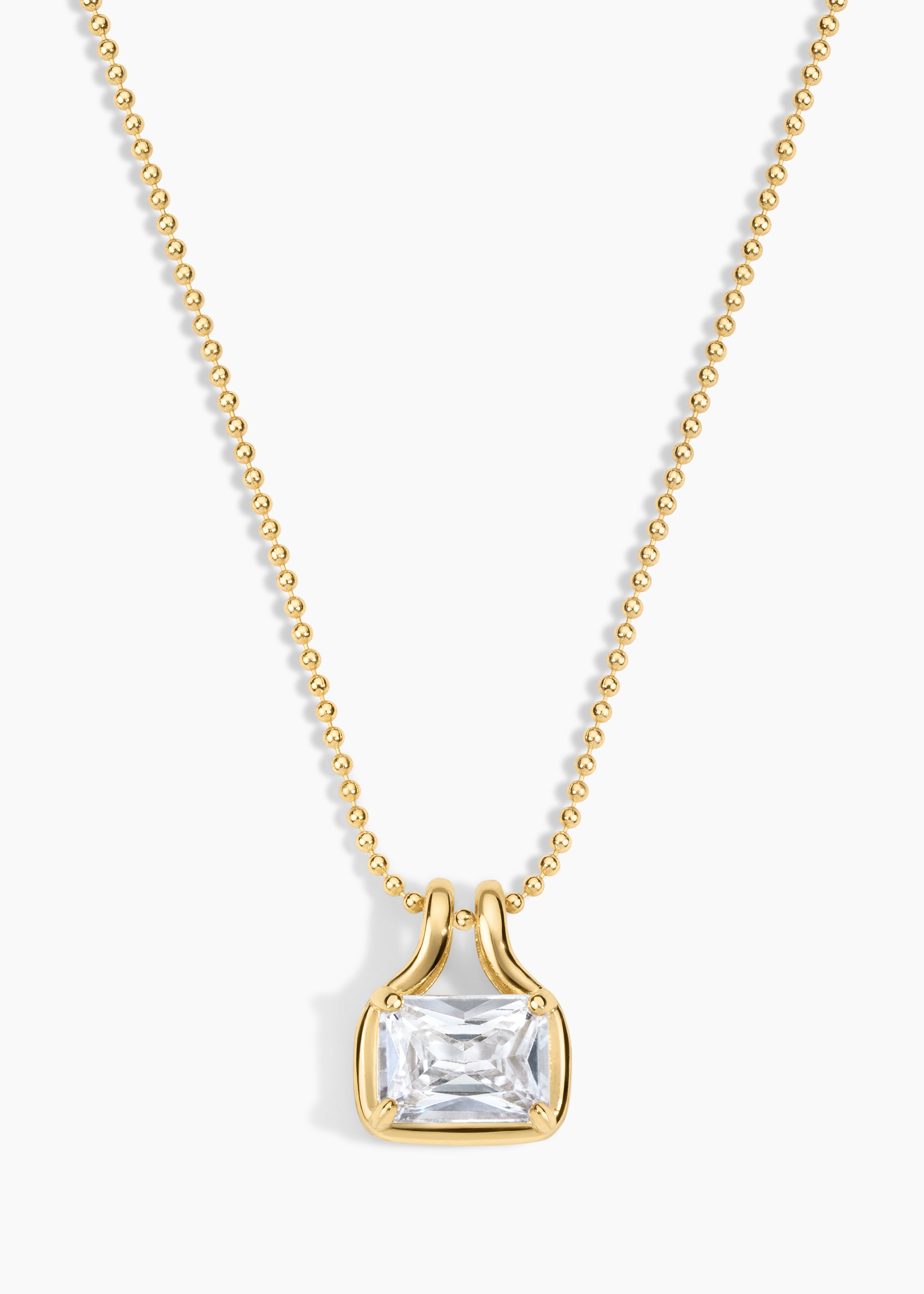 Dawson Necklace, gold chain necklace with a bezel-set emerald-cut crystal pendant