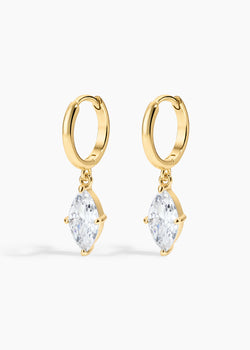 Shay Hoops, gold huggie hoops with a large marquise crystal drop